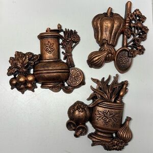 Set of 3 vintage Coppercraft Guild wall hangings with various vegetables